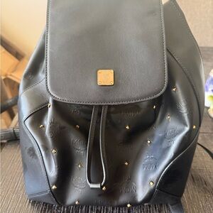 MCM Black Backpack with Gold Accents